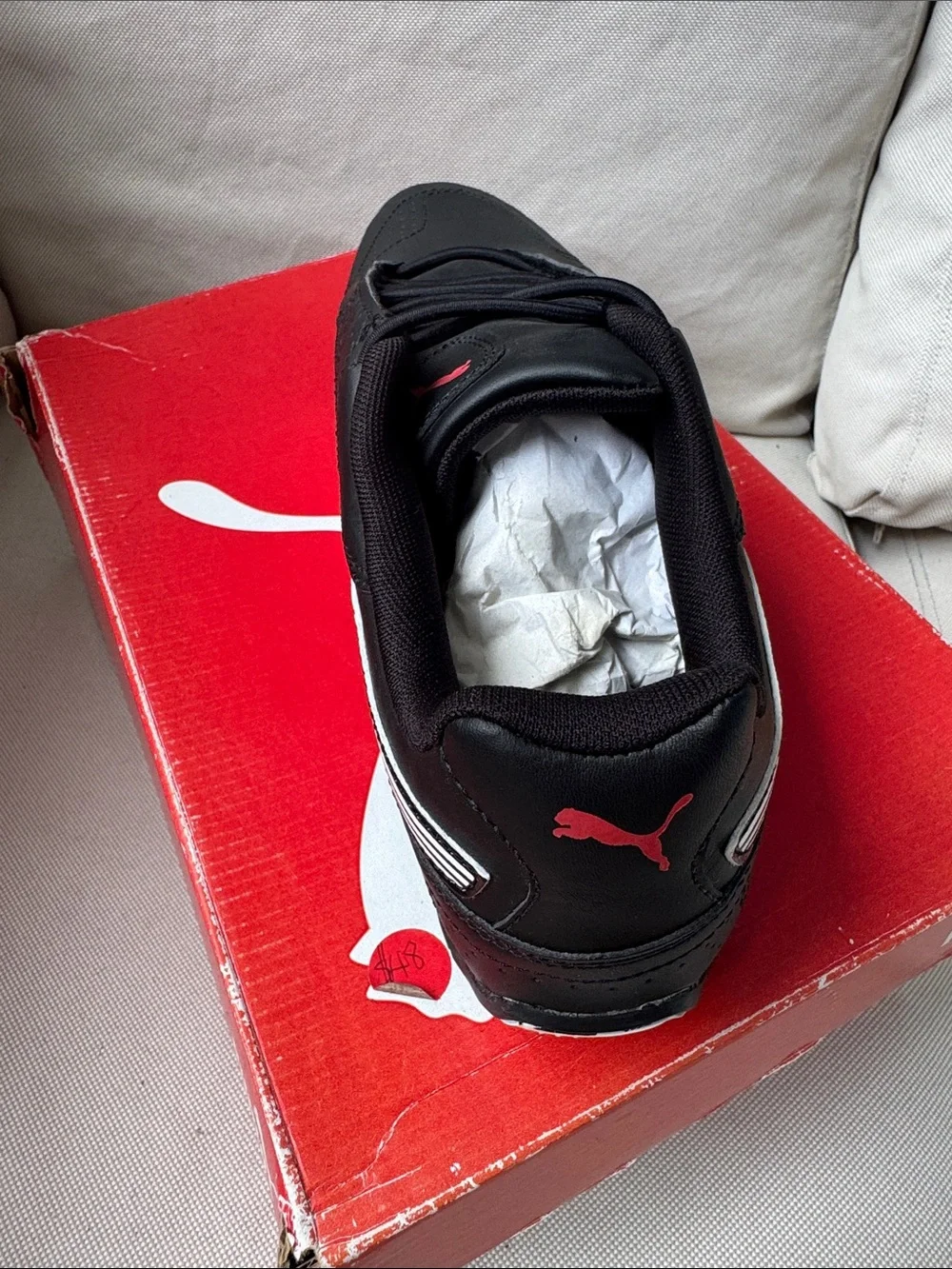 Puma Men’s Black Sneaker with White Formstrip and Red Logo